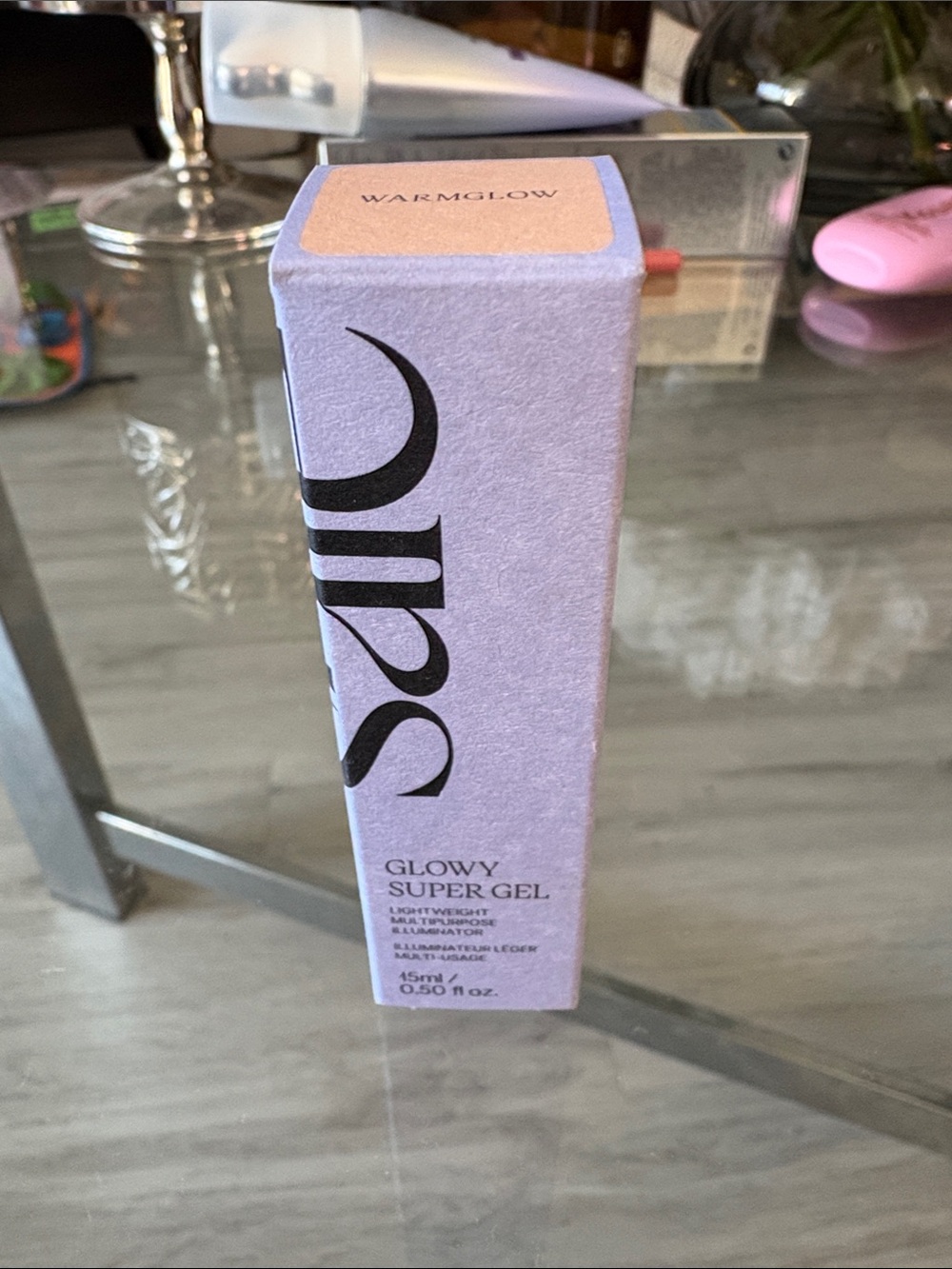 Saie Glowy Super Gel in Warm Glow - Lavender Packaging with Peach Label